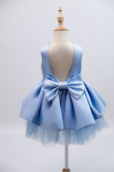 The Perfect Blue Bow Dress for Your Little Girl's Special Day
